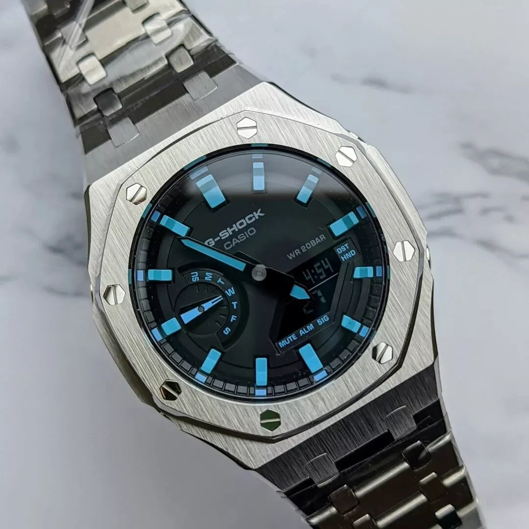 CASIOAK BLUE DETAIL WITH SILVER STRAP - GA2100